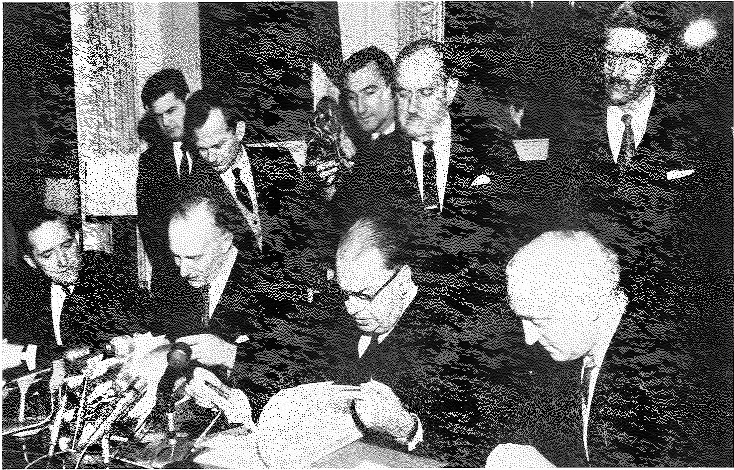 Paul Martin, as Secretary of State for External Affairs, at the Franco-Canadian Cultural signing November 17, 1965. To his left is Marcel Cadeaux.