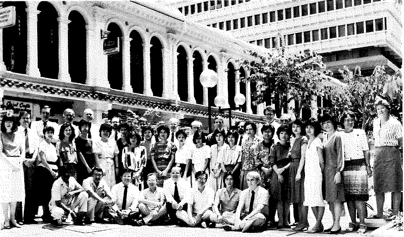 Front row: Osman bin Hussein, Shaik Abu Bakar, Frank Quah, David Lee, Peter Ho, Yeow Koon Kwok, Richard Soh, Ghyslain Lacroix. Second row: Susan Poapst, Dick McGreggor, Melani Cutts, Juen Tsai, Pee Hong Chua, Poh Peng Wong, Lilian Ong, Jeannie Sng, Nancy Tan, Molly Toh, Margaret Lim, Susie Cheng, Violet Giam, Anna Khoo, Gloria Beck, Alice Ng, Maureen Koh, Florence Lim, Chun Whye Teh, Kwee Luan Tan, Eva Grodde, Ann Dale-Harris. Third row: George W. Seymour (Head of Post), Otch von Finckenstein, Jim Pomeroy, David Sproule, Ken Kelly, Ernest Allen, Michael Leir, Kerry Kennedy, John Burroughs, Jean Boucher, Lloyd Dowswell. Absent: Rose Clouston, Ken Curry, Nancy Durnan, David De Rose, Phillies Williams.
