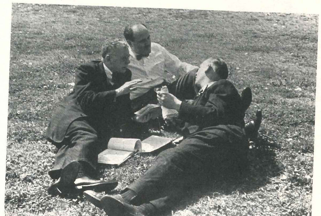 In fact, it’s a shot of Andrew MacNaughton, George Ignatieff and an unidentified colleague near Lake Success at the United Nations.