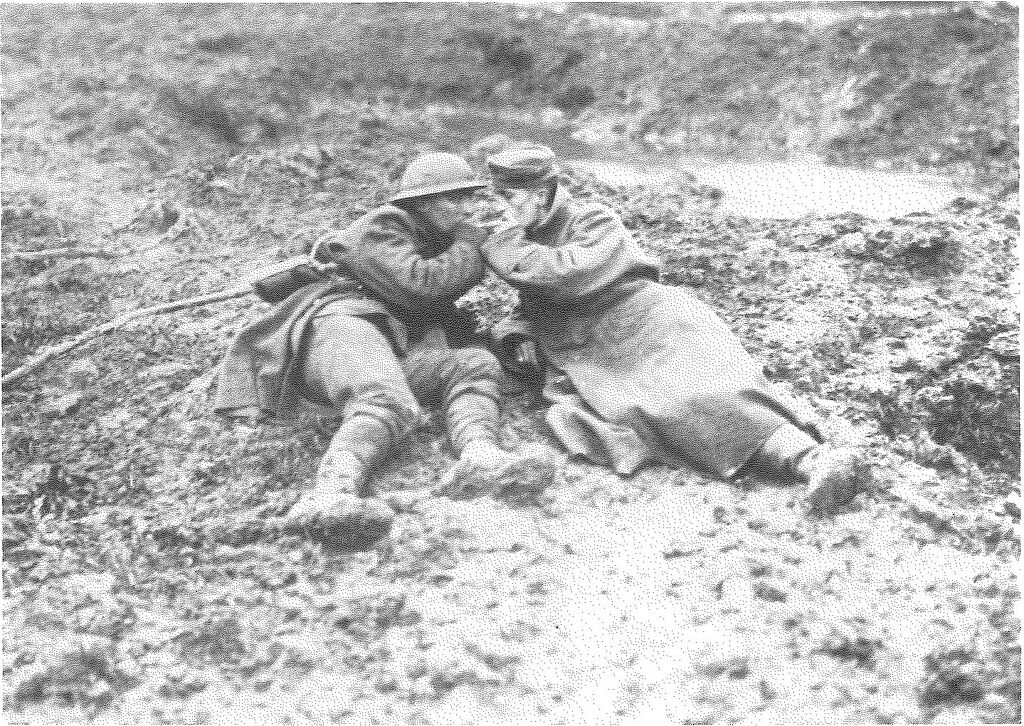 A wounded Canadian and wounded German in the mud on Passchendaele, light up, November 1917