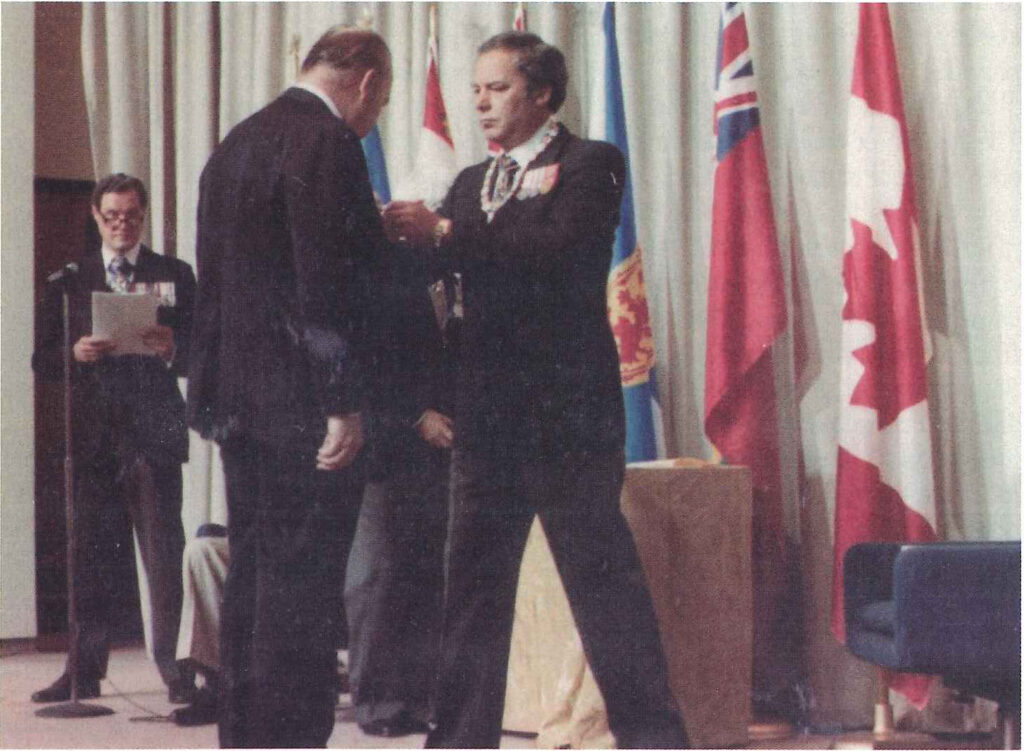 John receiving the Order of Canada.