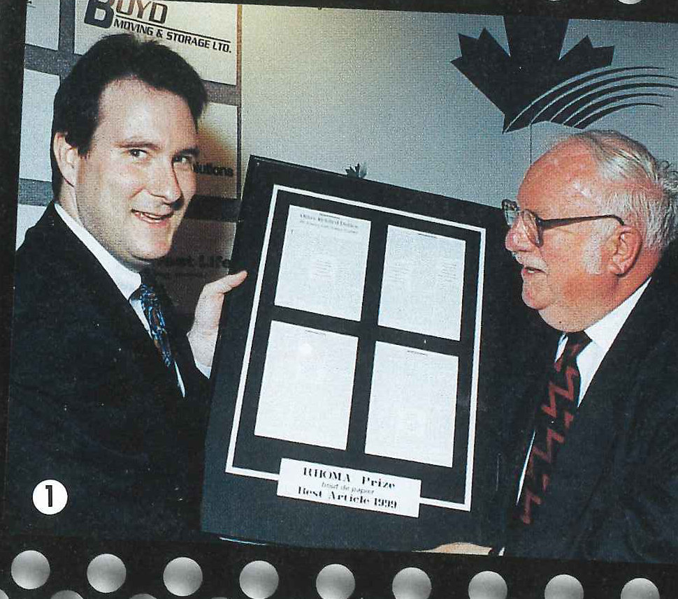 John Hadwen (right) presenting RHOMA Award to John Morrow (left).