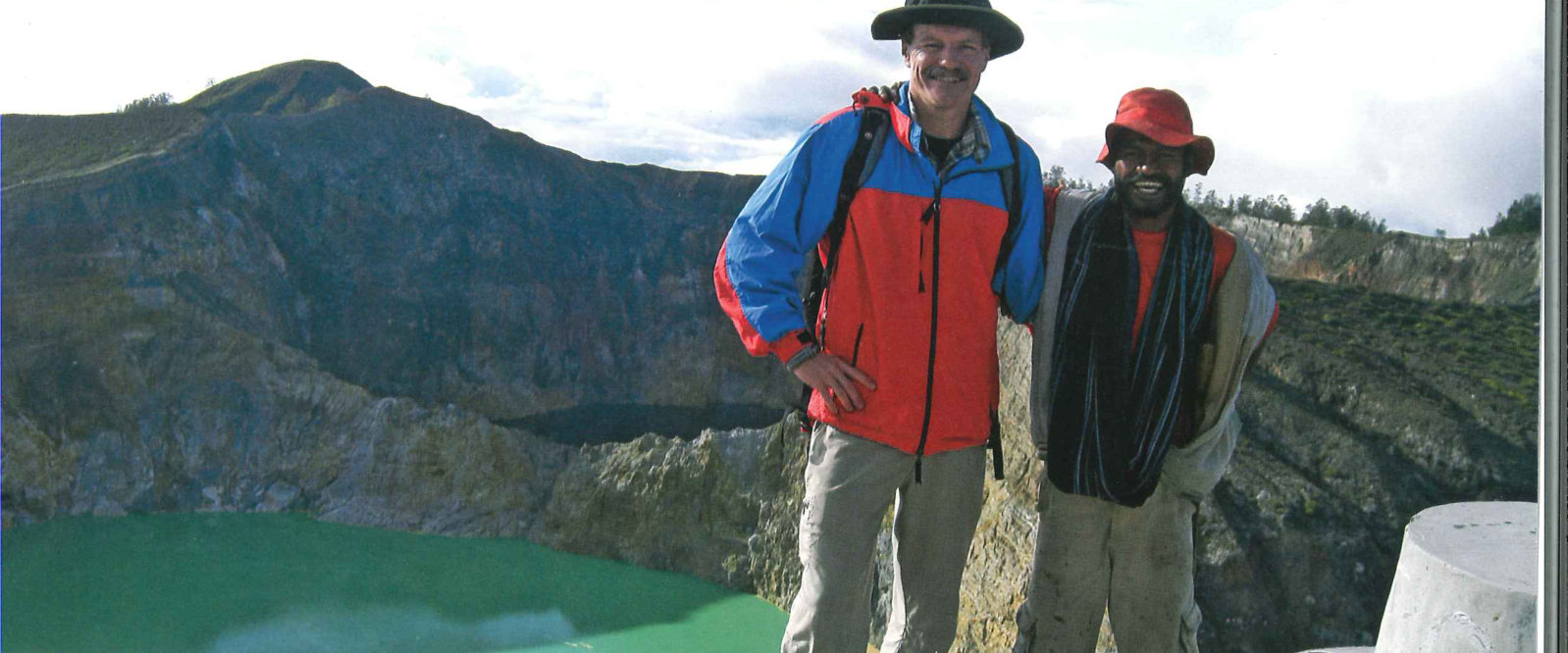 Author with friend at summit of Kelimutu volcano, Flores