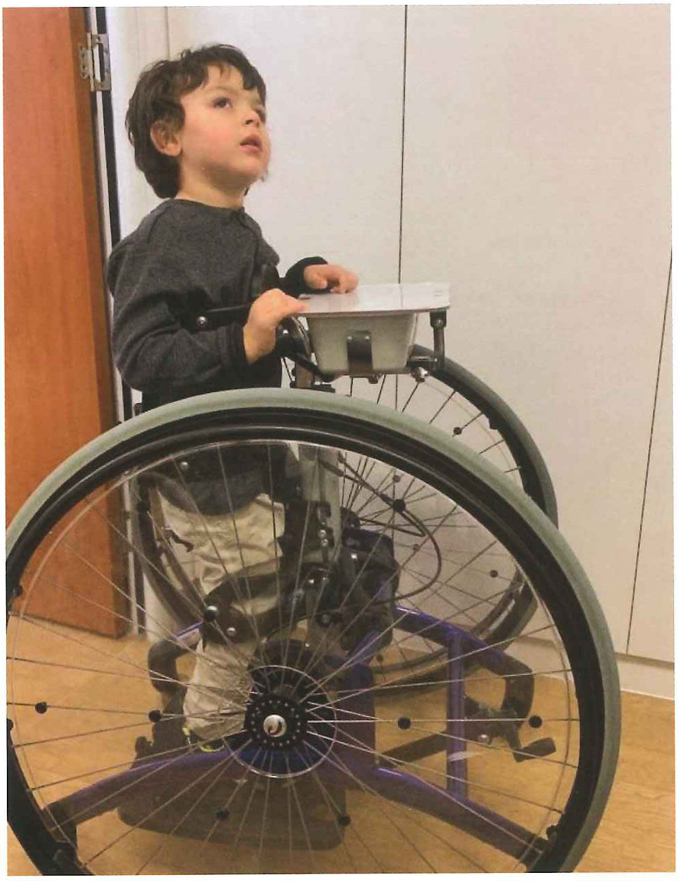 Zachy trying out a mobility aid